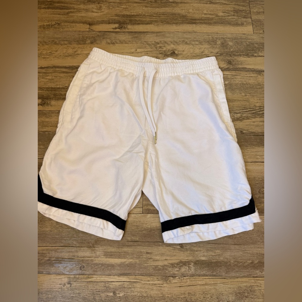Men’s H&M White long length shorts.